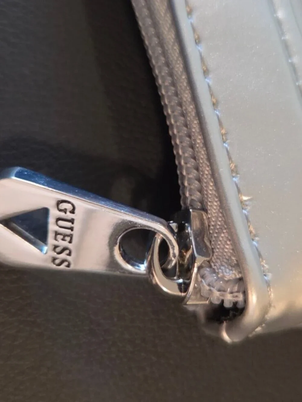 Guess Silver Embossed Logo Cosmetic Bag